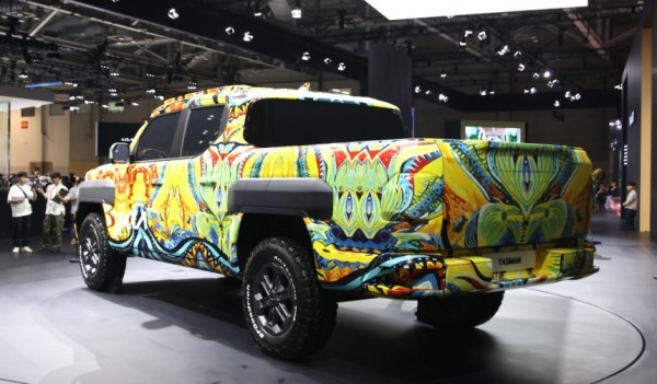 Рамный пикап Kia Tasman показан в пестром камуфляже Рамный пикап Kia Tasman показан в пестром камуфляже